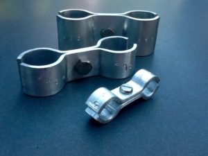 Double port pipe clamps